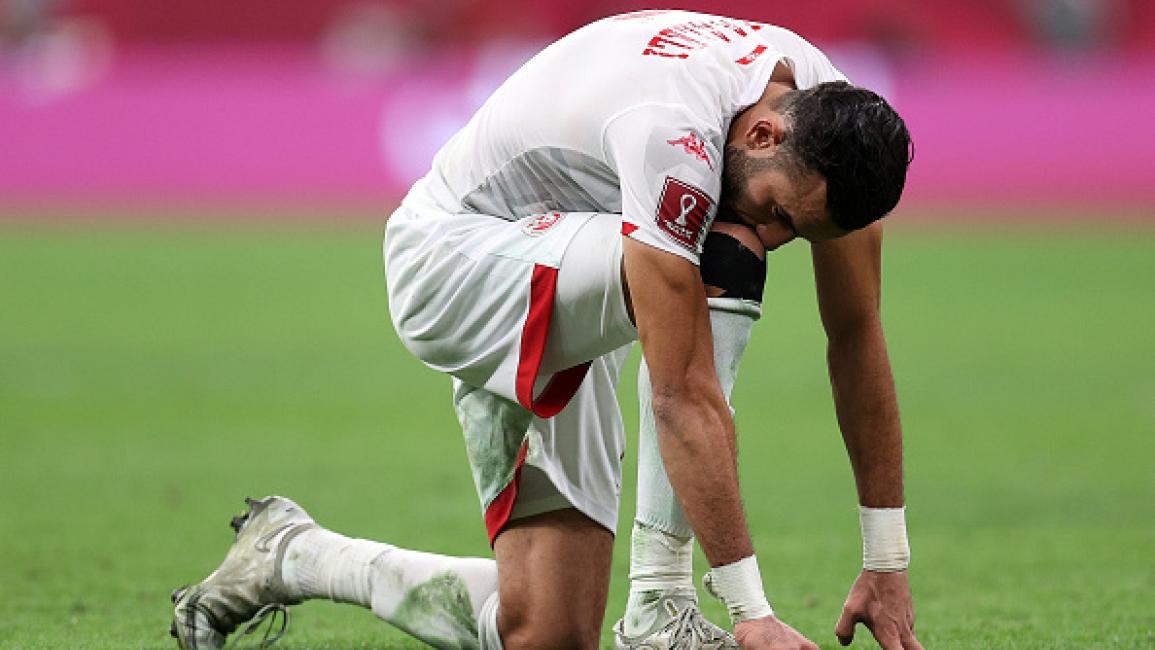 AL KHOR, QATAR - DECEMBER 18: Gaylen es-Seglali (R) of Tunisia in action against Yacine Brahimi (11) of Algeria during the FIFA Arab Cup final match between Tunisia and Algeria at Al Bayt stadium in Al Khor, Qatar on December 18, 2021 (Photo by Mohammed Dabbous/Anadolu Agency via Getty Images)	