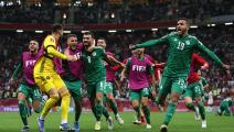 AL KHOR, QATAR - DECEMBER 18: Amir Sayoud of Algeria celebrates with teammates Merouane Zerrouki, Yassine Titraoui and Abderrahmane Medjadel after scoring their team's first goal during the FIFA Arab Cup Qatar 2021 Final match between Tunisia and Algeria at Al Bayt Stadium on December 18, 2021 in Al Khor, Qatar. (Photo by Cathrin Mueller - FIFA/FIFA via Getty Images)	